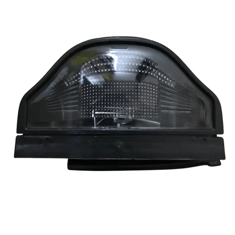 M710401 Фонарь подсветки номера черный (M710401) BSG 08-818-001 — изображение 1